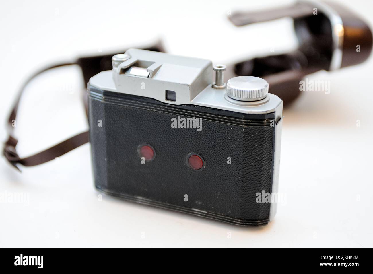 A vintage camera isolated on a white background Stock Photo - Alamy
