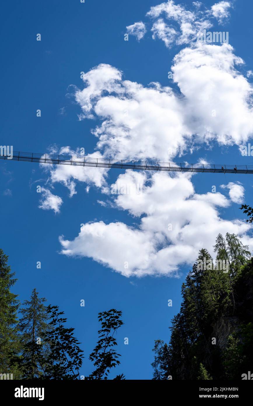 Holzgau suspension bridge, rope suspension bridge, spans the Höhenbach ...