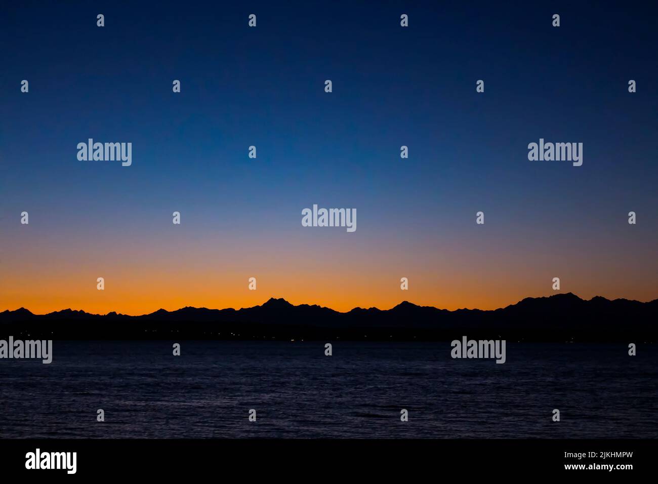 The Olympic mountains silhouette and the sunset view from Golden