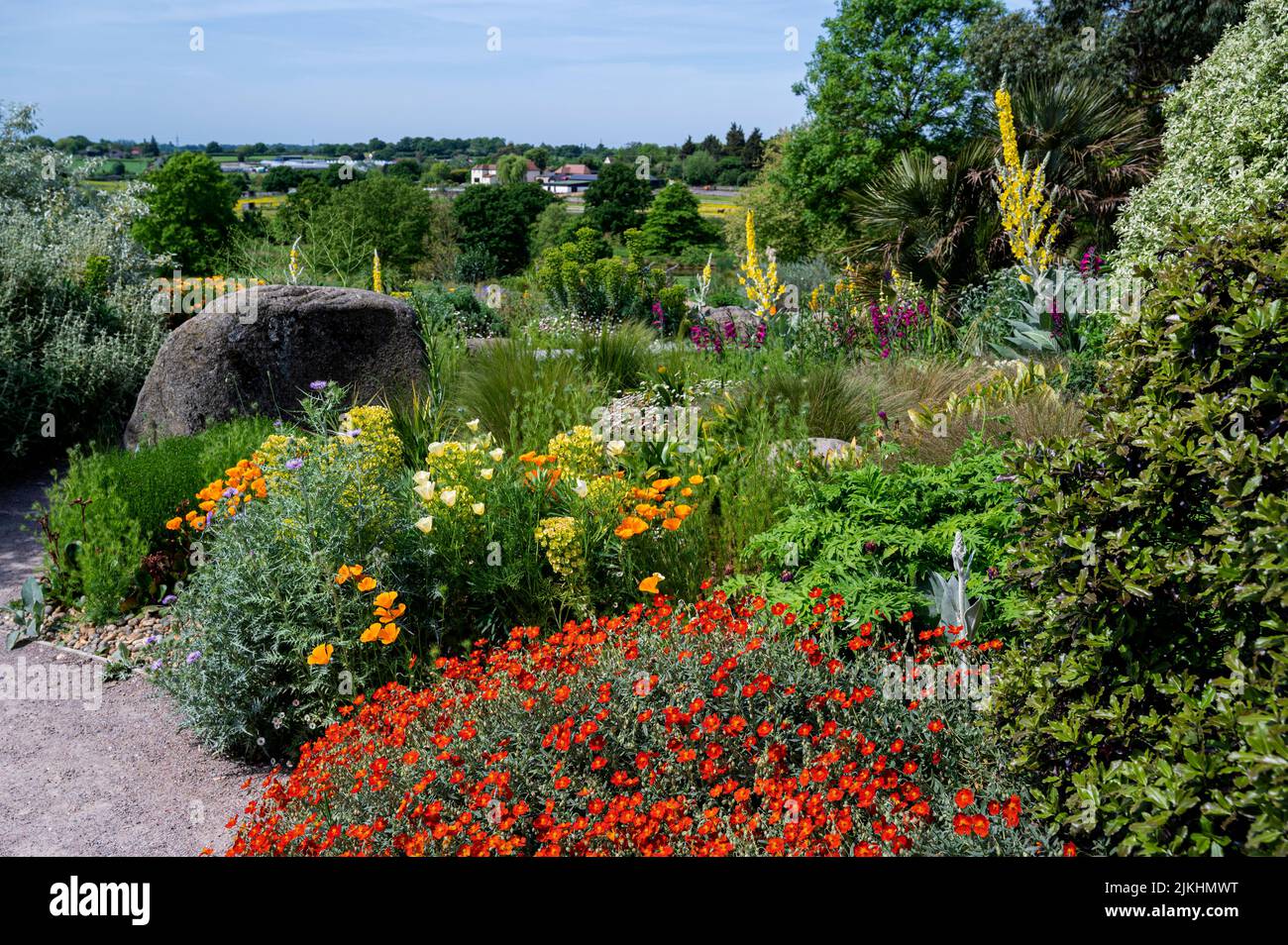 RHS Hyde Hall, Dry Garden, in late spring sunshine. Looking it's colourful best. Stock Photo