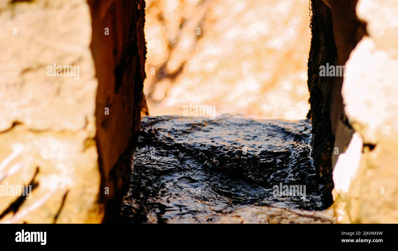 Water stream between rocks hi-res stock photography and images - Alamy