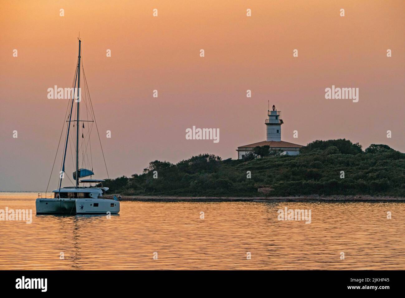 Alcanada lighthouse near Alcudia, Mallorca, Balearic Islands, Spain Stock Photo