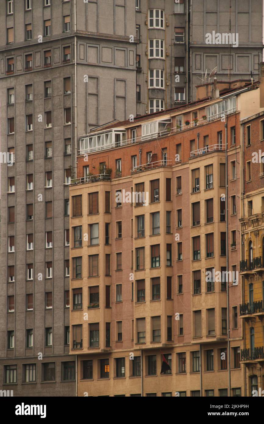 A vertical shot of historic building facades in Bilbao, Spain Stock Photo