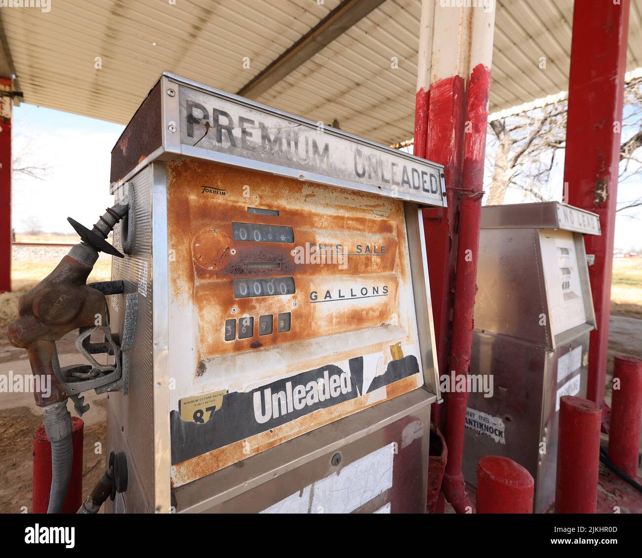 Closeup of a rusty non working old gasoline pumps at an abandoned gas