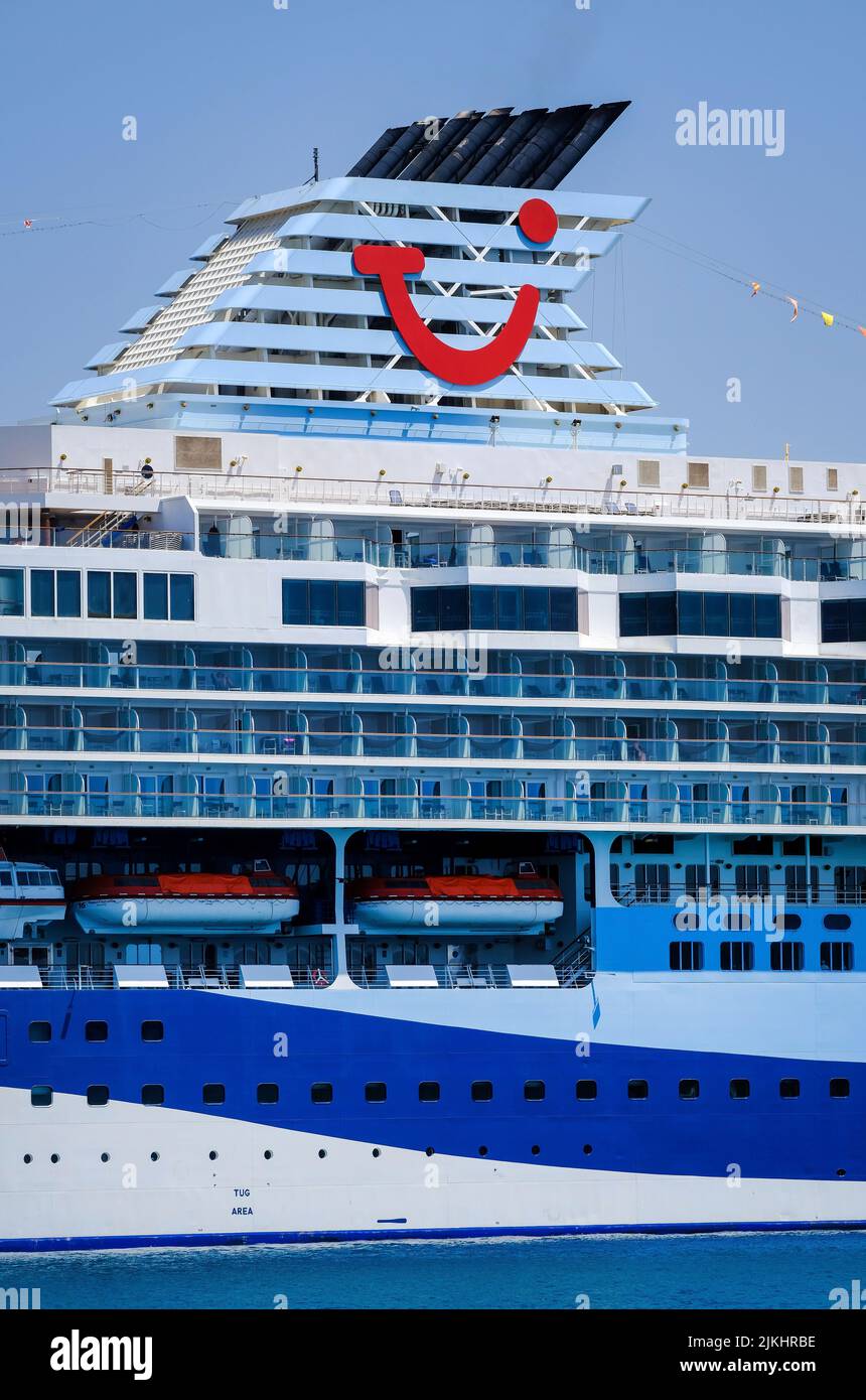 Corfu Town, Corfu, Greece - TUI cruise ship Marella Explorer is moored in the port of Corfu. The 262 meter long ship has a mass of 9, 900 tons. Stock Photo