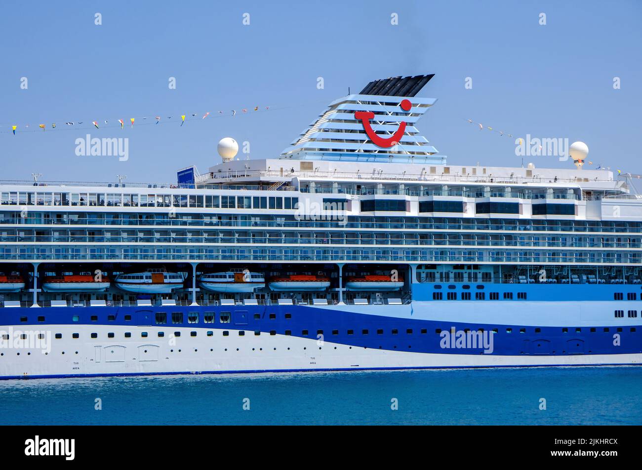 Corfu Town, Corfu, Greece - TUI cruise ship Marella Explorer is moored in the port of Corfu. The 262 meter long ship has a mass of 9, 900 tons. Stock Photo