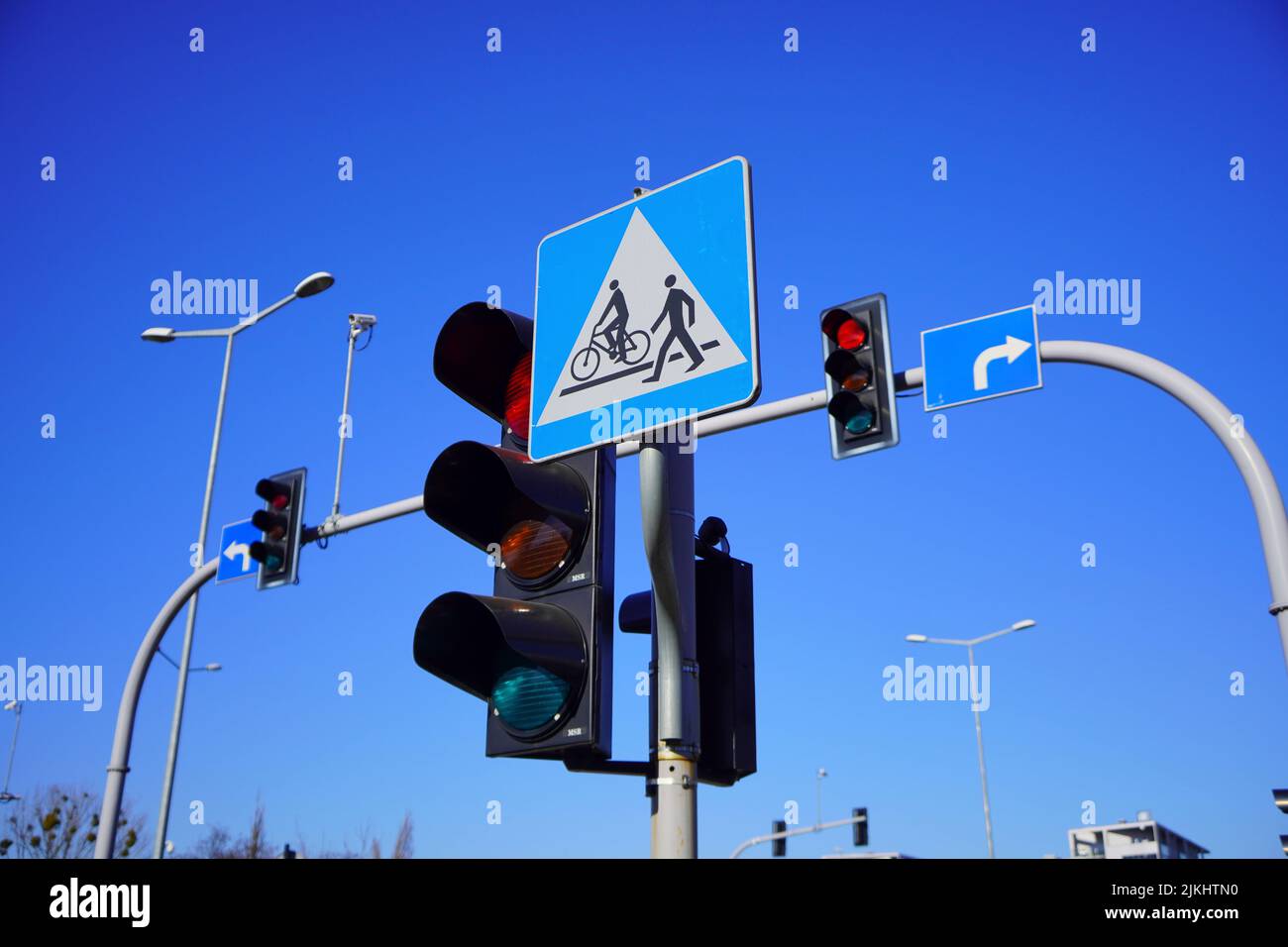 a low angle shot of the traffic lights and PL Road sign Stock Photo Alamy