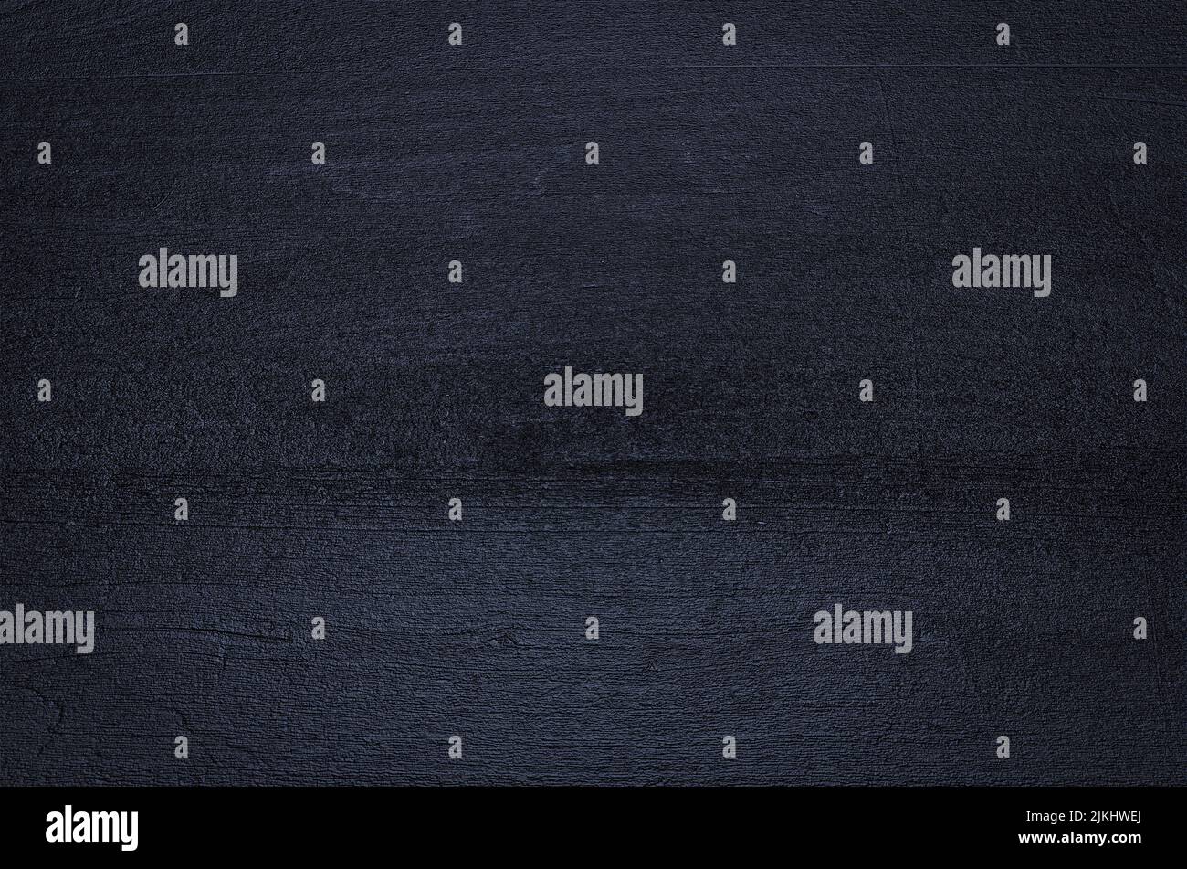 A dark black rock texture background Stock Photo