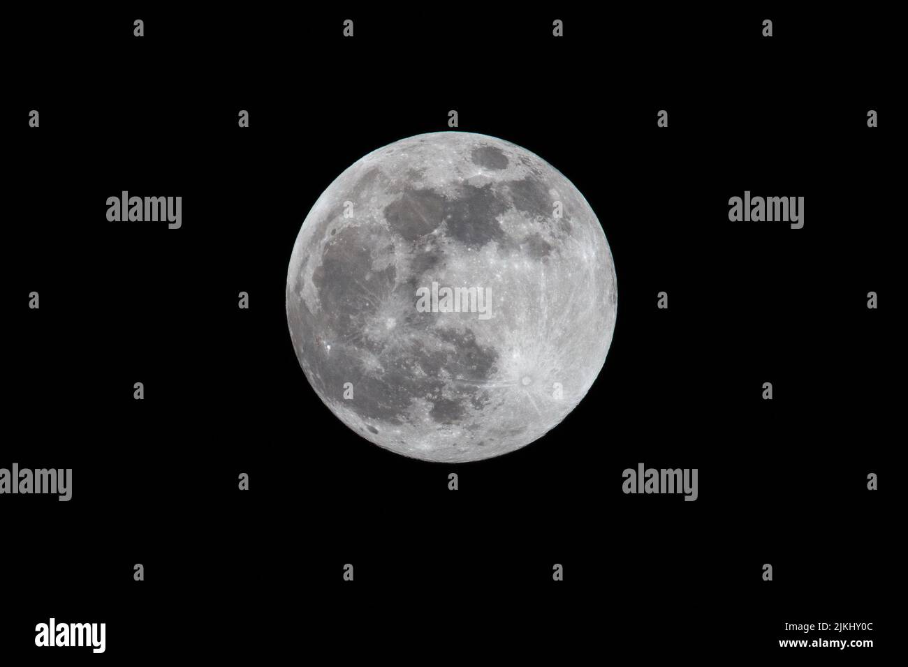 The full moon isolated in the dark sky Stock Photo - Alamy