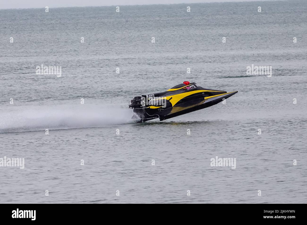 yellow powerboat