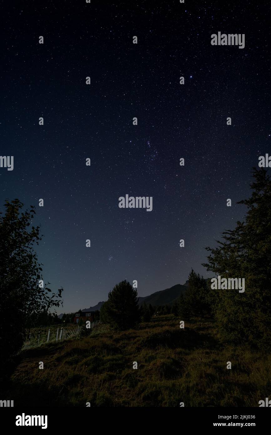 A vertical shot of the beautiful starry sky Stock Photo - Alamy