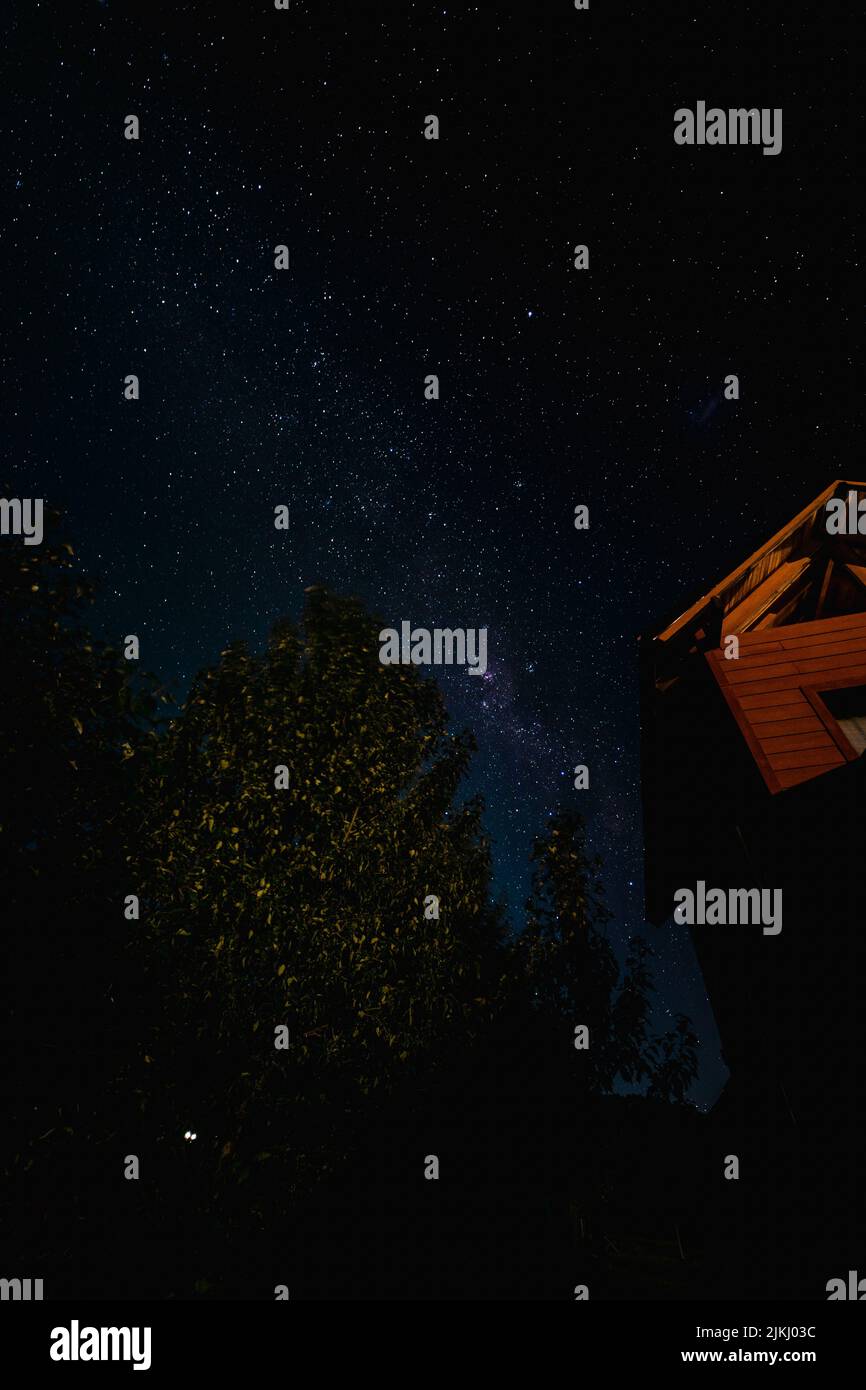 A vertical shot of the beautiful starry sky Stock Photo - Alamy