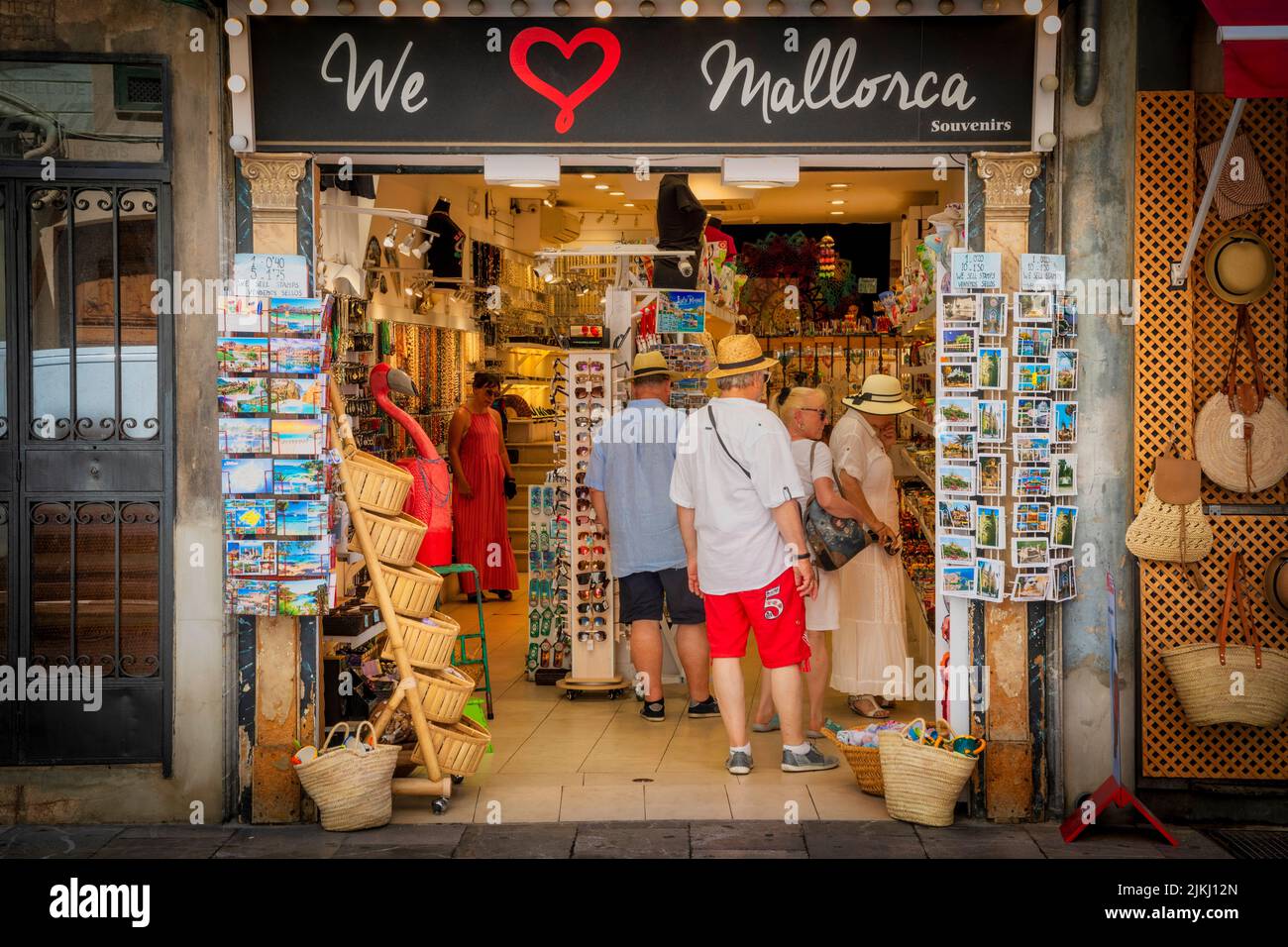 Spain, Balearic islands, Mallorca, Palma. A souvenir shop WE LOVE MALLORCA in Palma de Mallorca with people looking the items Stock Photo