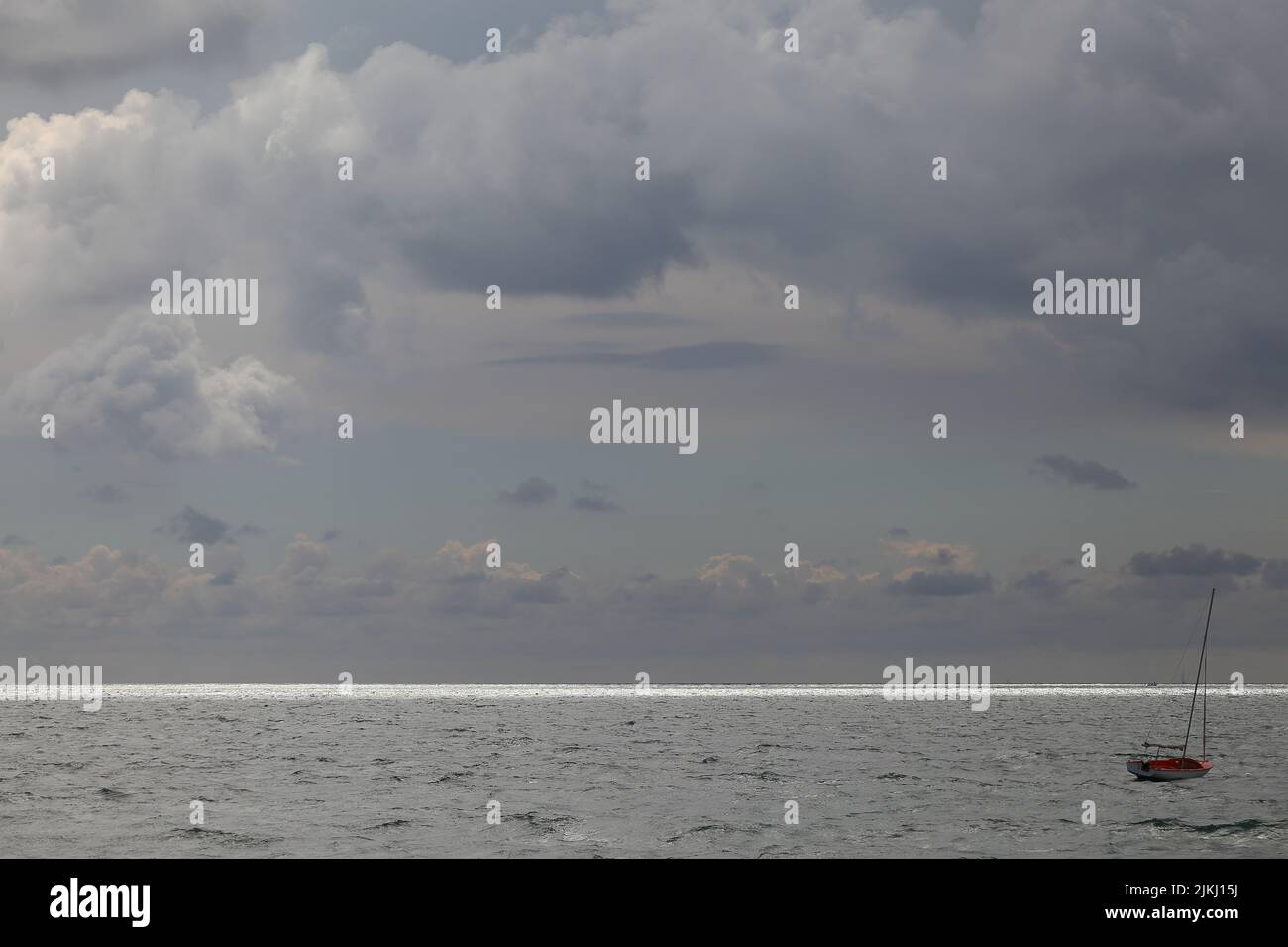 Sailing boat against open sea hi-res stock photography and images - Alamy