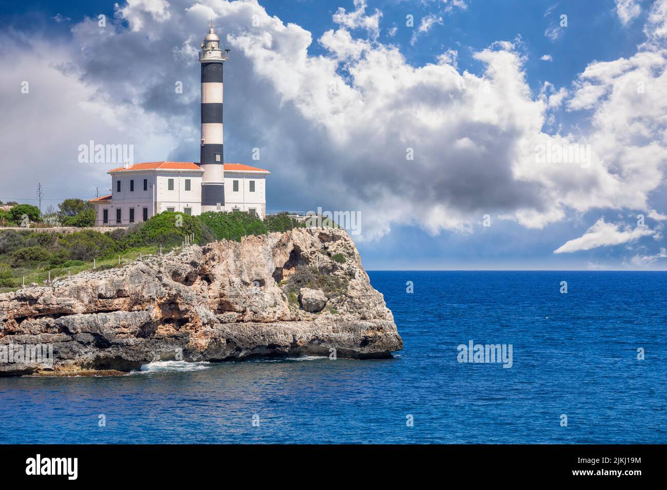 Spain, Balearic islands, Mallorca, district of Felanitx, Portocolom. The lighthouse of Punta de Ses Crestes Stock Photo