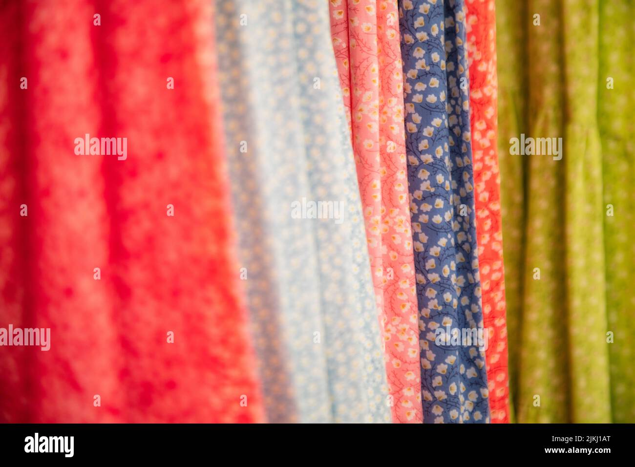 Spain, Balearic islands, Mallorca, district of Manacor, Calas de Mallorca. Colorful beach clothes for sale in the shops in the city center, close up view of the fabric Stock Photo