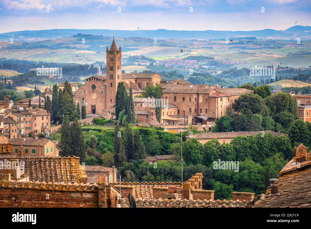 Italy, Tuscany, Siena. Santa Maria dei Servi and landscape of the hills around Siena city centre Stock Photo