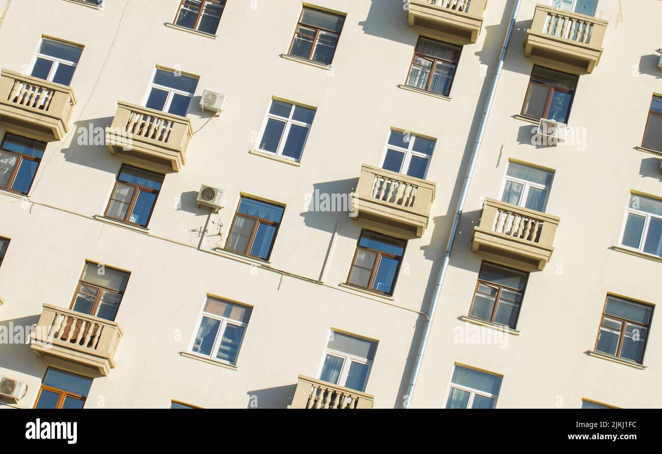 A photo of the facade of a white building Stock Photo - Alamy