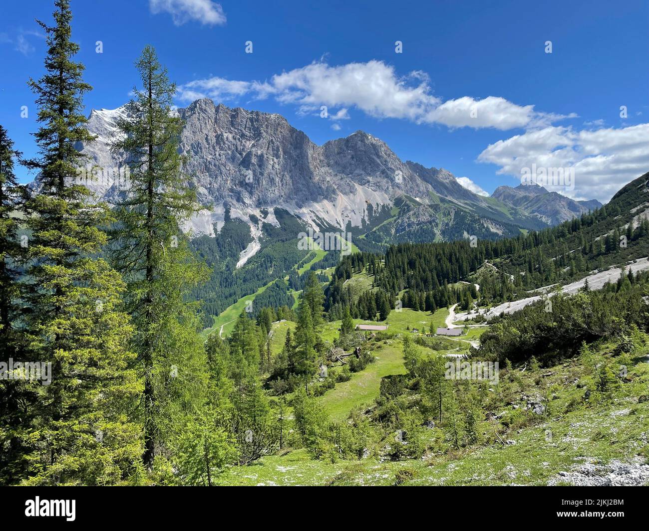 View of Zugspitzmassiv and Seebenalm, Gaistal, hiking, nature, mountains, blue sky, activity, Mieminger Kette, Leutasch, Seefeld, Mösern, Reith, Scharnitz, Tirols Hochplateau, Tirol, Austria Stock Photo