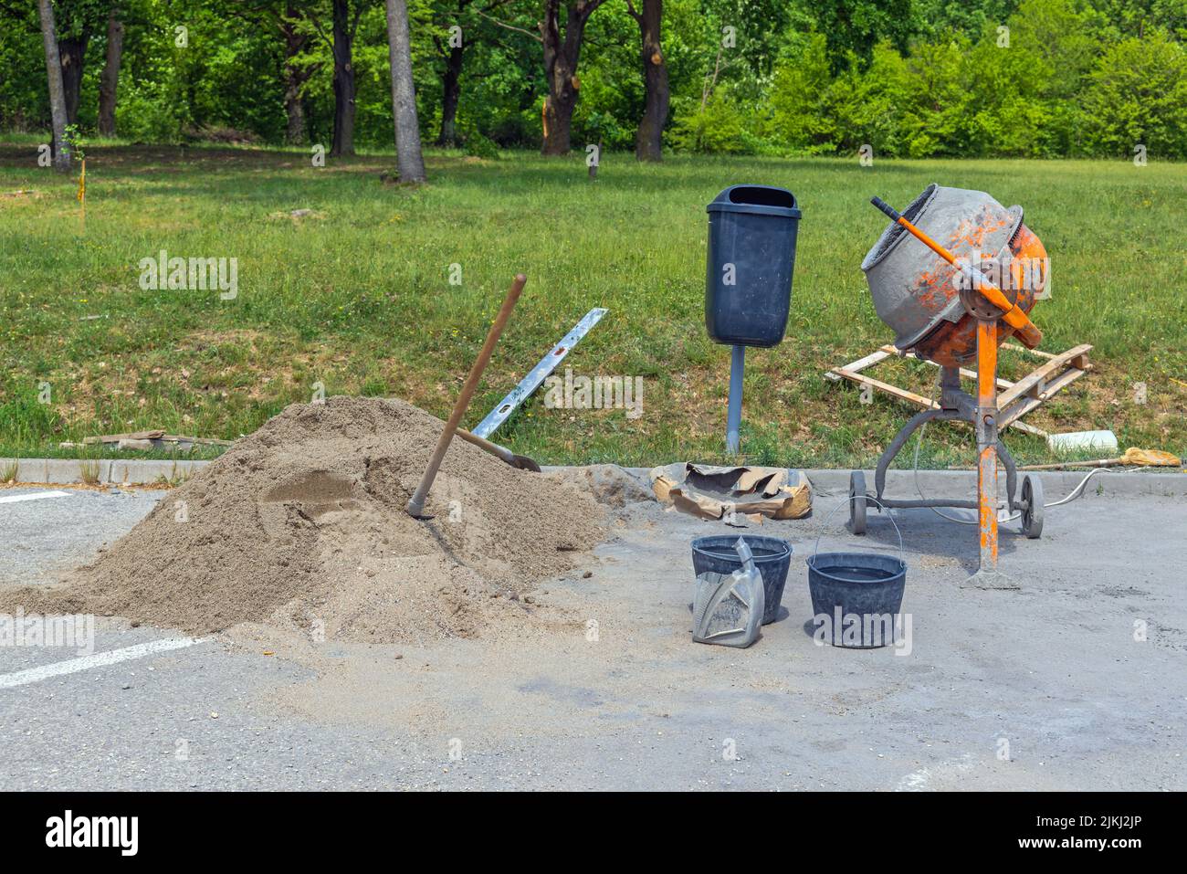 Concrete Cement Mixer Machine Equipment Construction Site in Park Stock Photo