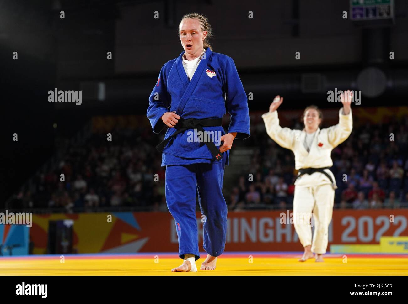 England's Gemma Howell (left) reacts after defeat by Canada's Catherine Beauchemin-Pinard in the Women's -63 kg Final at Coventry Arena on day five of the 2022 Commonwealth Games. Picture date: Tuesday August 2, 2022. Stock Photo