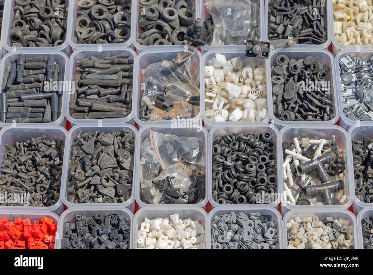 Small Rubber Spare Parts Mix in Trays for Vehicles Stock Photo