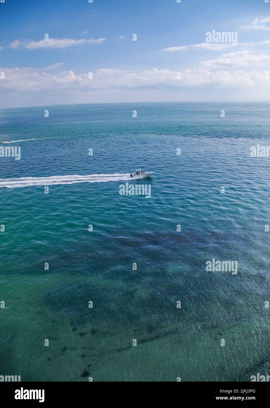 An aerial view of a boat sailing in the North Atlantic Ocean on the ...