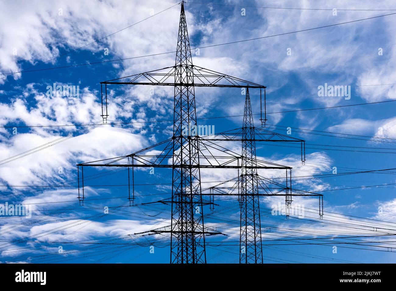 Many power poles and power lines Stock Photo