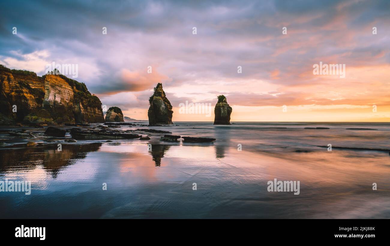 A beautiful view of the Three Sisters and the Elephant Rock, Tongaporutu, New Zealand Stock Photo
