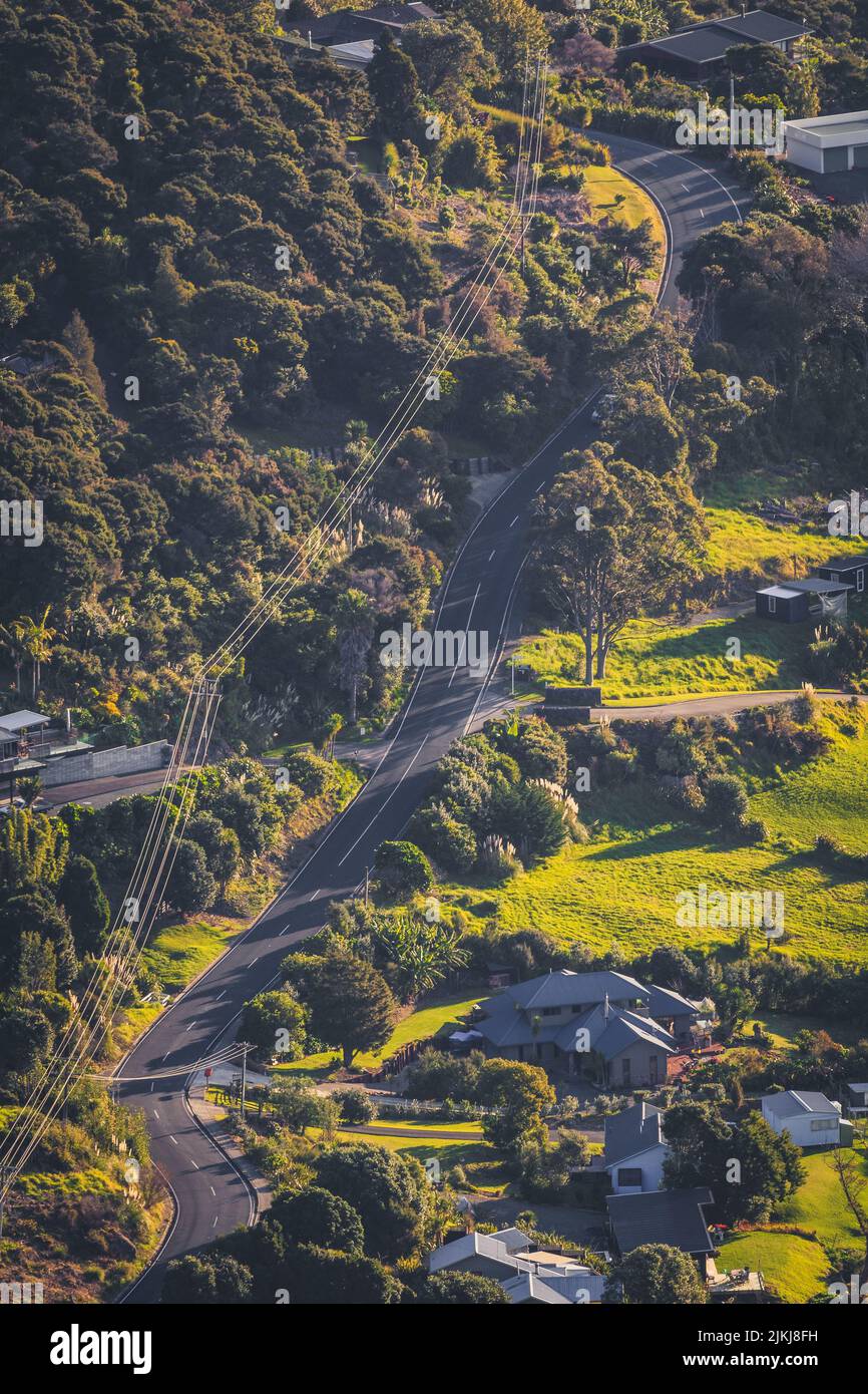 An aerial view of the asphalt road from the high point of Mount Manaia