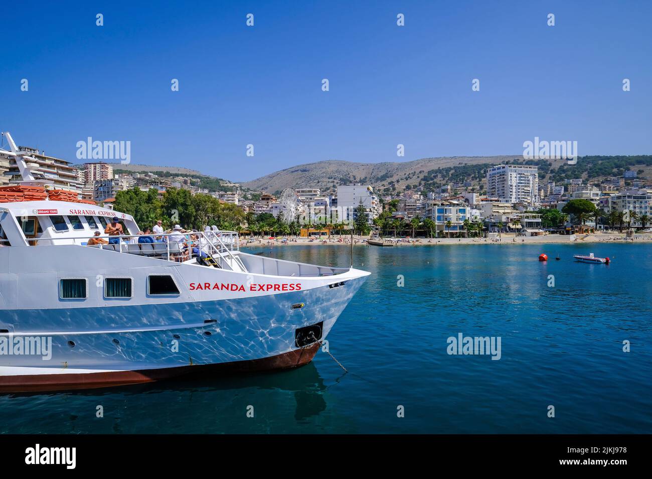 Saranda, Albania - seaside resort Saranda on the Albanian Riviera. Front ferry Saranda Express connects Saranda with Corfu Greece. Stock Photo