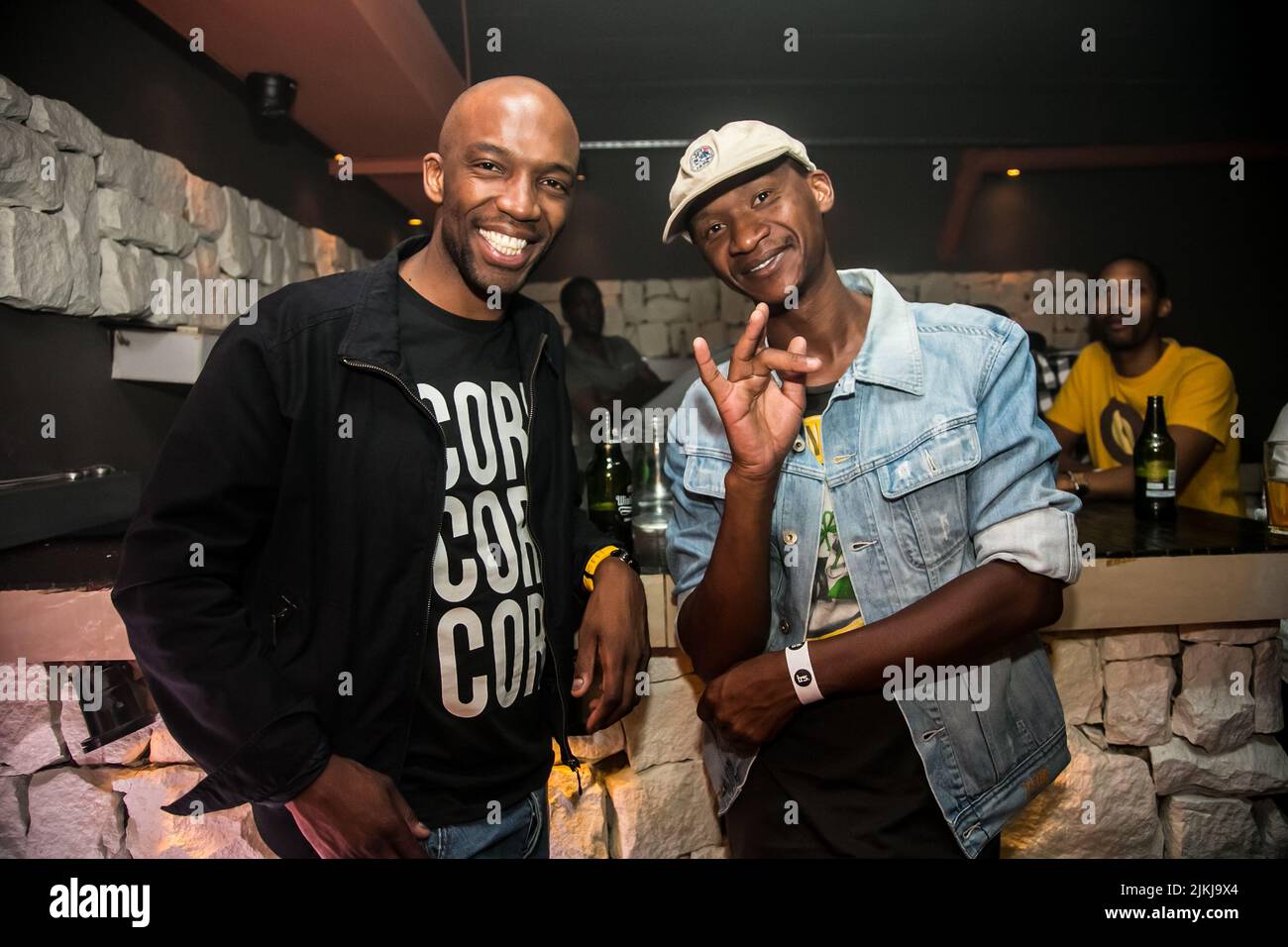 Johannesburg, South Africa December 11, 2015 Diverse people inside a night club bar Stock