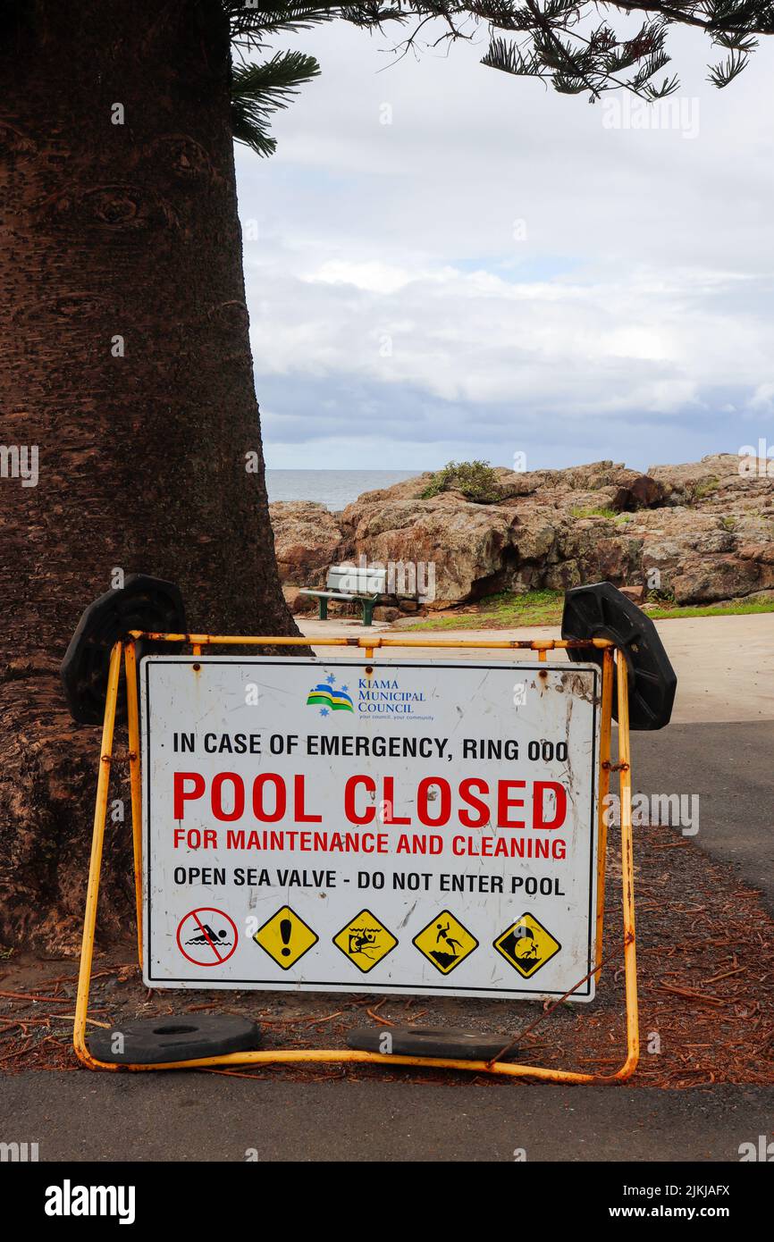 A vertical shot of a sign of the pool closed for maintenance and cleaning Stock Photo