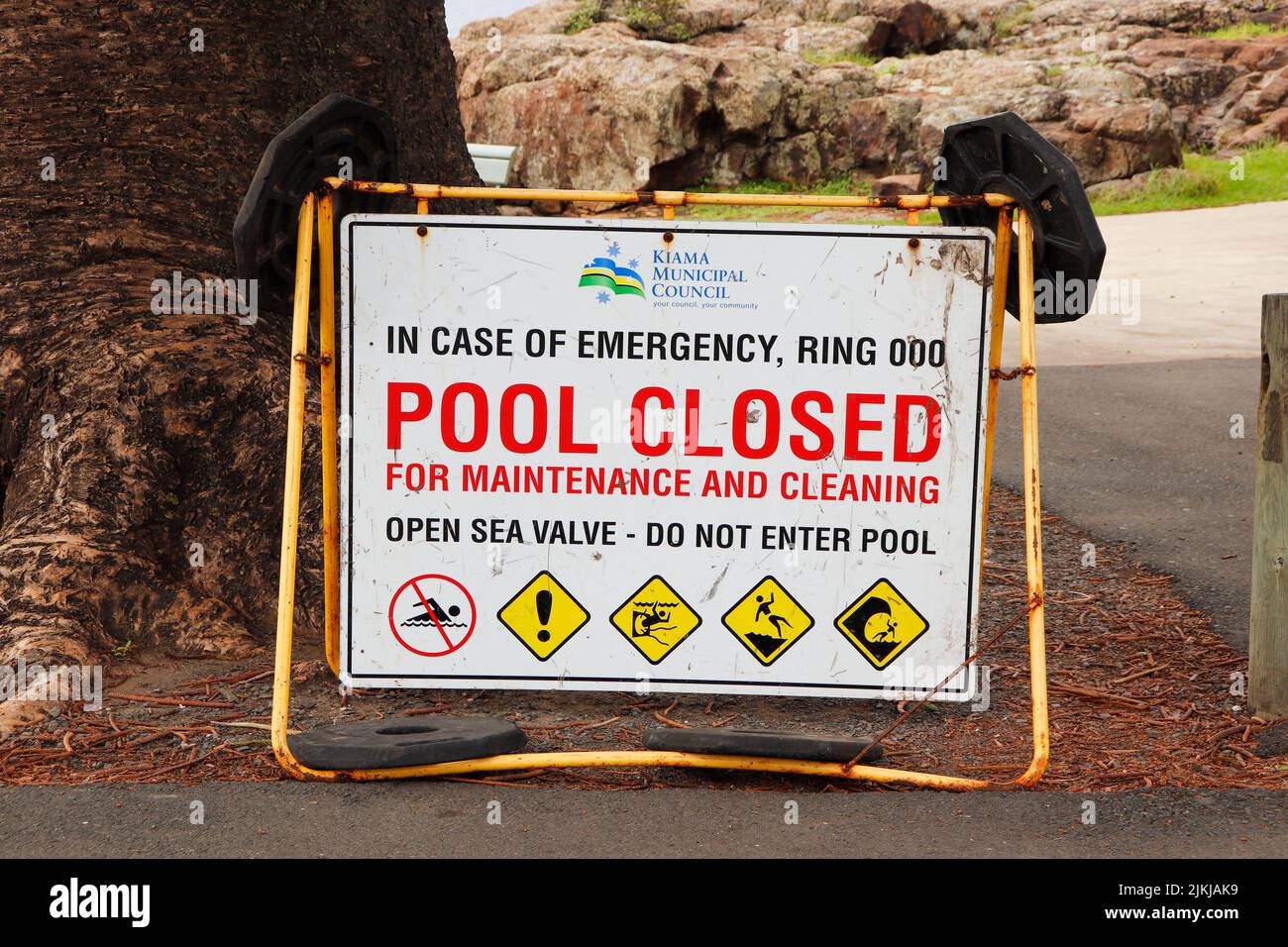 A closeup shot of a sign of the pool closed for maintenance and cleaning Stock Photo