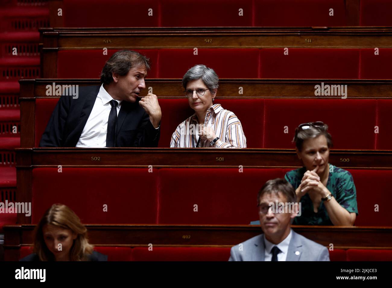 Members of parliament Jerome Guedj of Parti Socialiste (PS) and Sandrine Rousseau of the EELV ecologist party and the left-wing coalition NUPES attend the questions to the government session at the National Assembly in Paris, France, August 2, 2022. REUTERS/Benoit Tessier Stock Photo