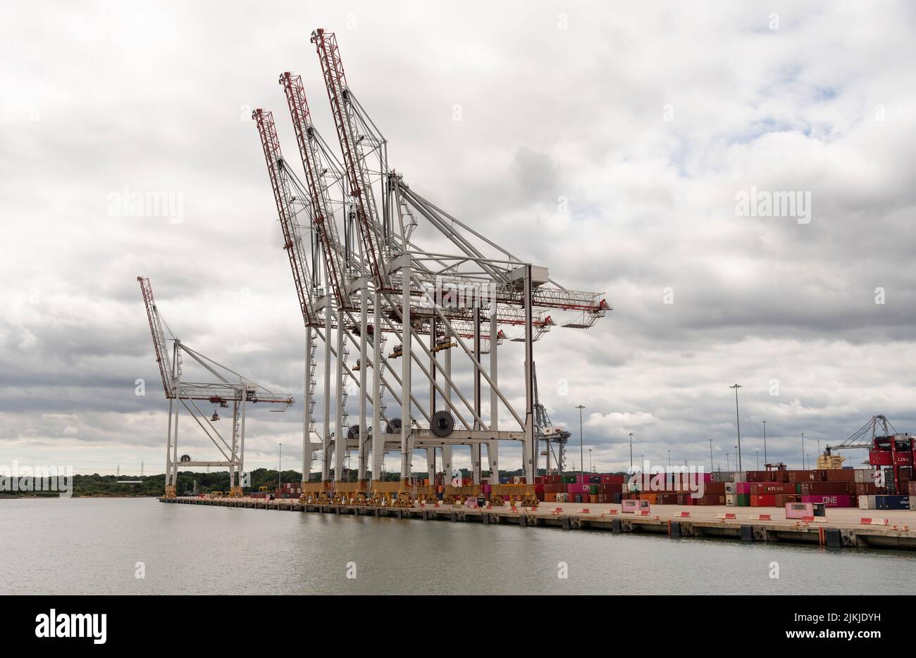 Southampton, England, UK. 2022. Large cranes waterside at a container ship terminal in southern England. Stock Photo