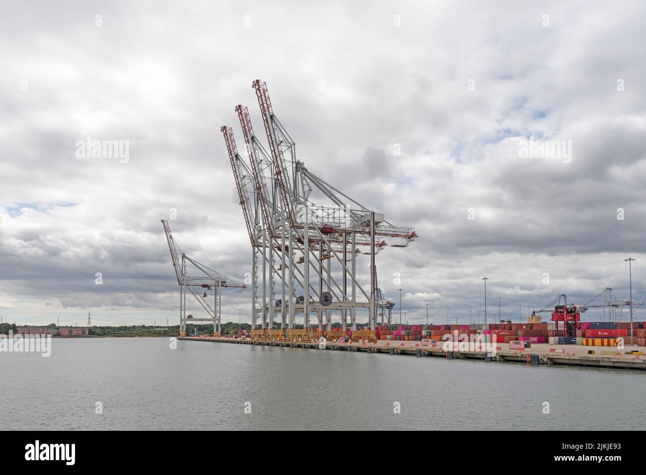 Southampton, England, UK. 2022. Large cranes waterside at a container ship terminal in southern England. Stock Photo