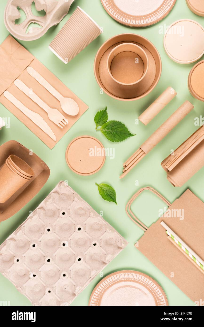 Vertical flat lay composition with eco tableware, paper utensils and ...