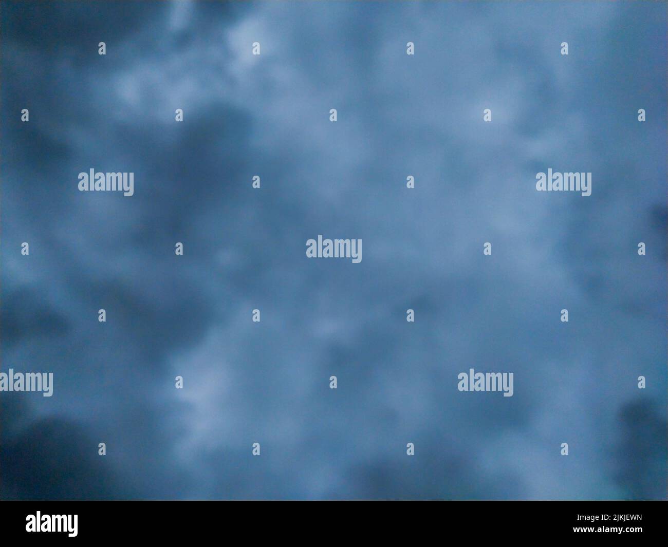 A dark abstract sky clouds background texture Stock Photo