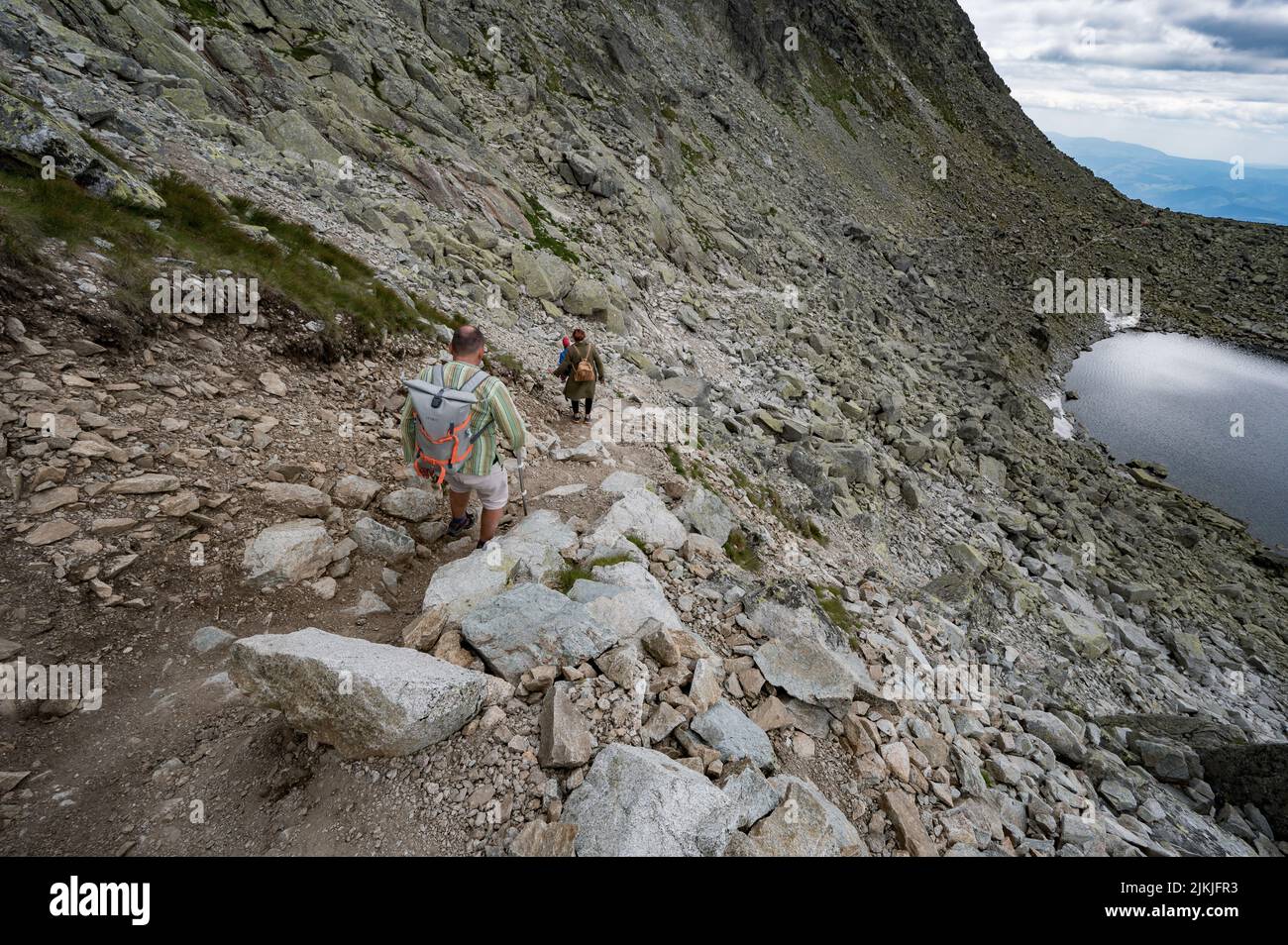 Back view male hiker tourist hi-res stock photography and images - Alamy