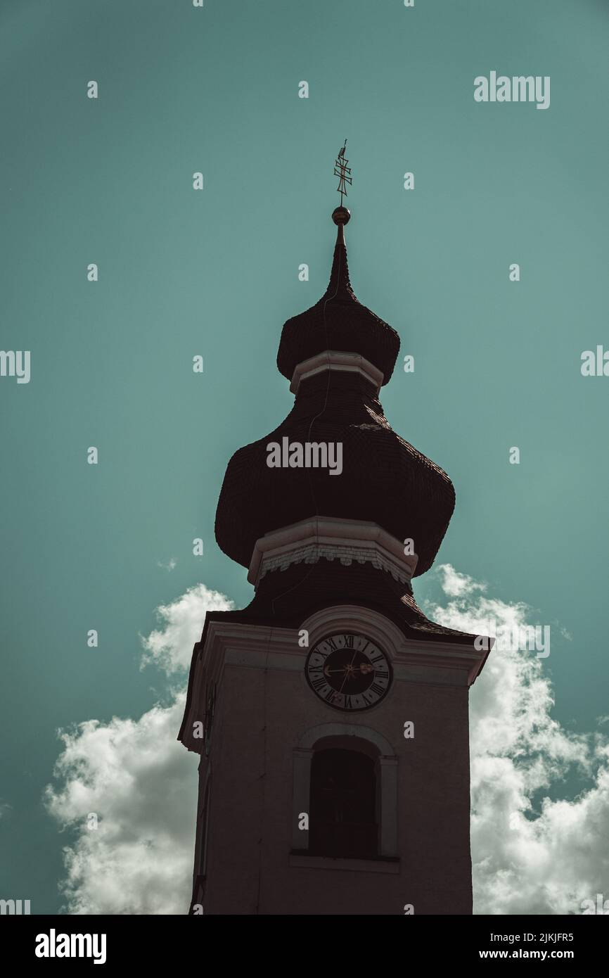 A vertical shot of the beautiful ancient church in Austria Stock Photo