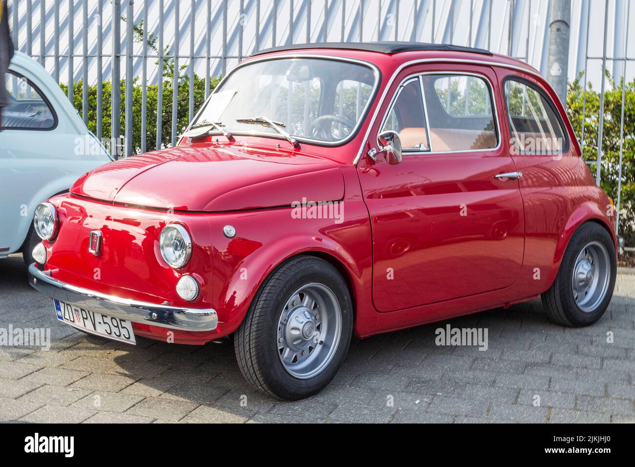 A Side shot of a red Zastava 750 old-timer city car on classical car exhibition Stock Photo