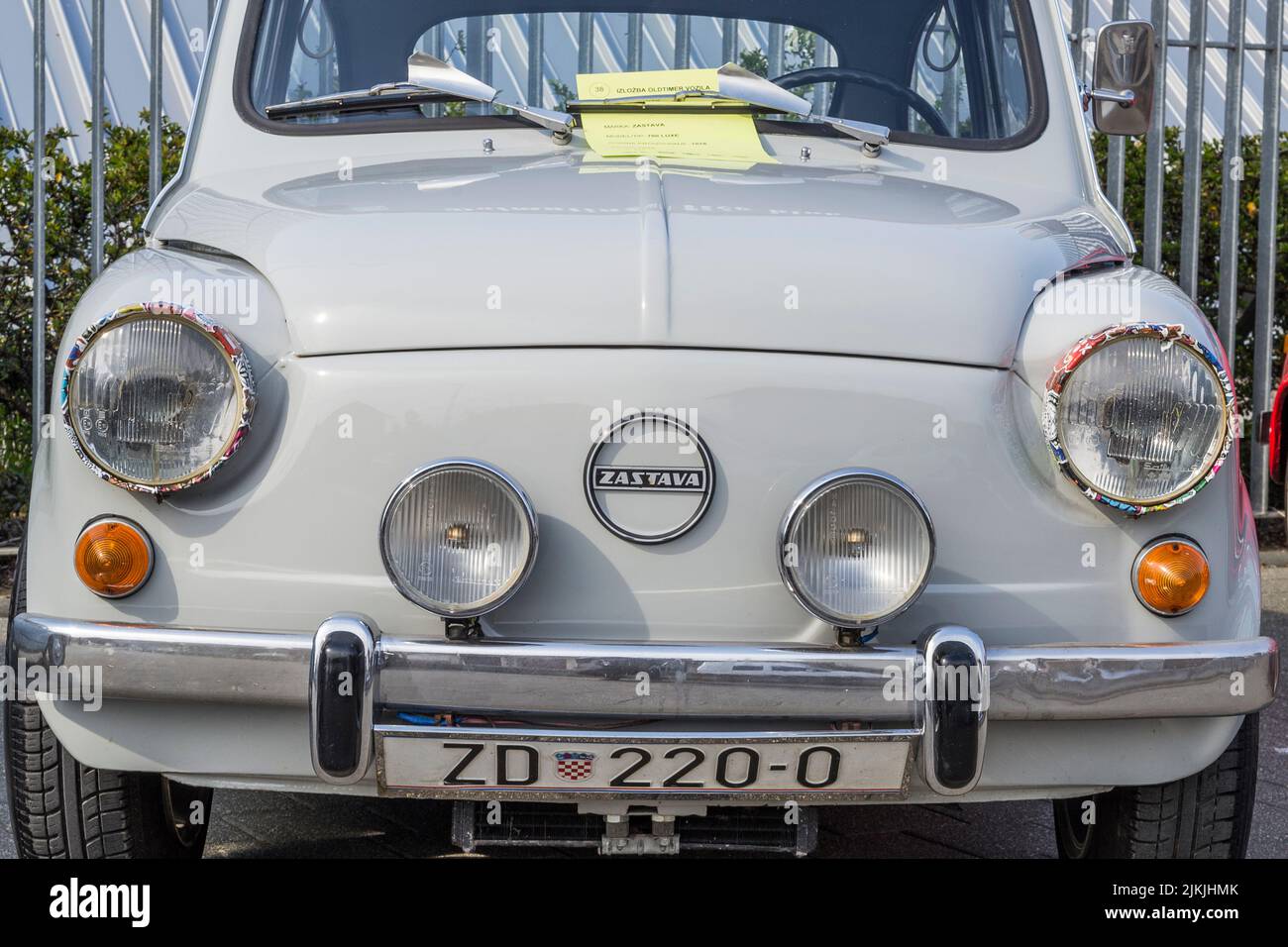 A Front shot of a gray Zastava 750 old-timer city car on classical car exhibition Stock Photo