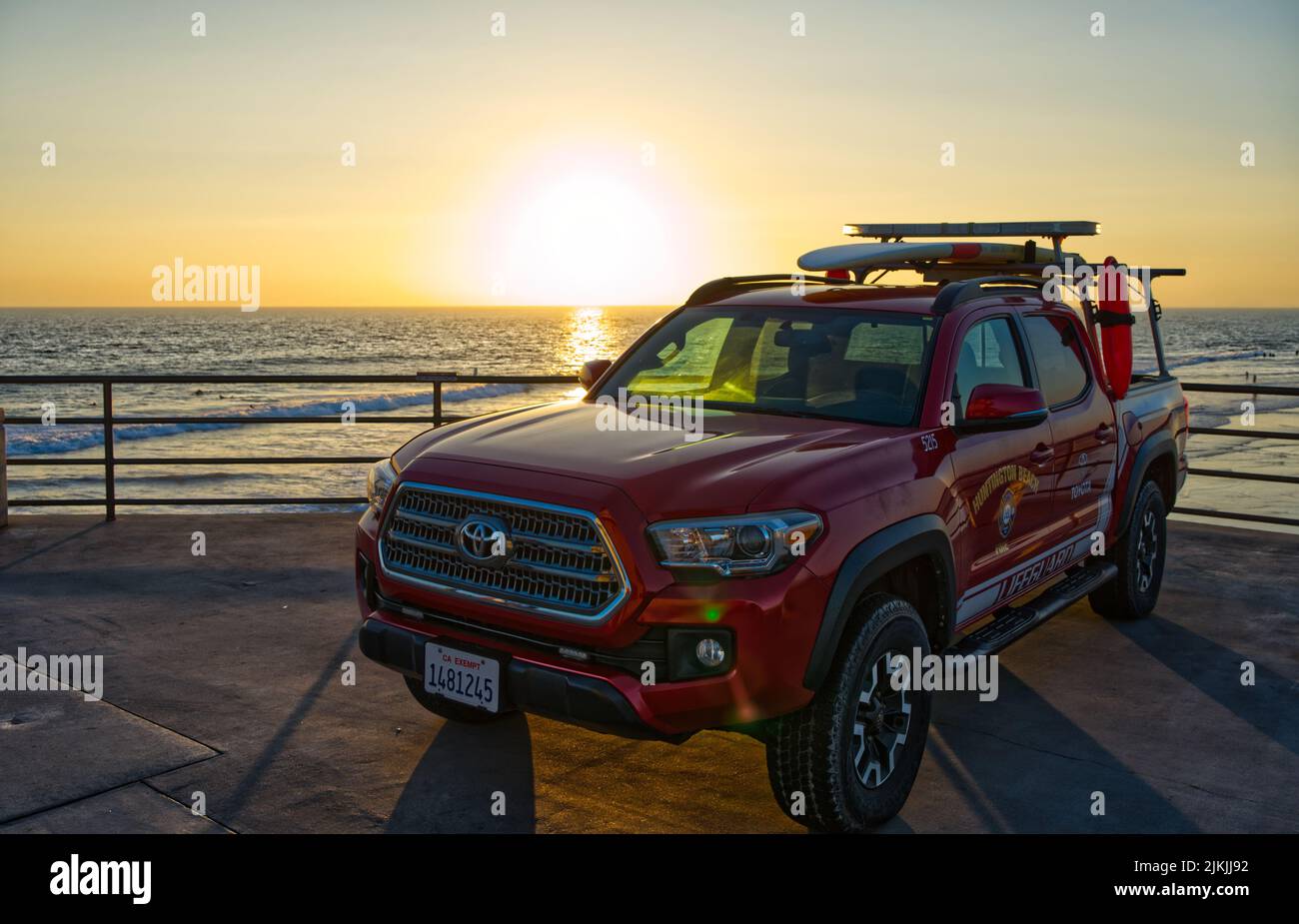 The lifeguard truck on Huntington Beach pier at sunset. Stock Photo