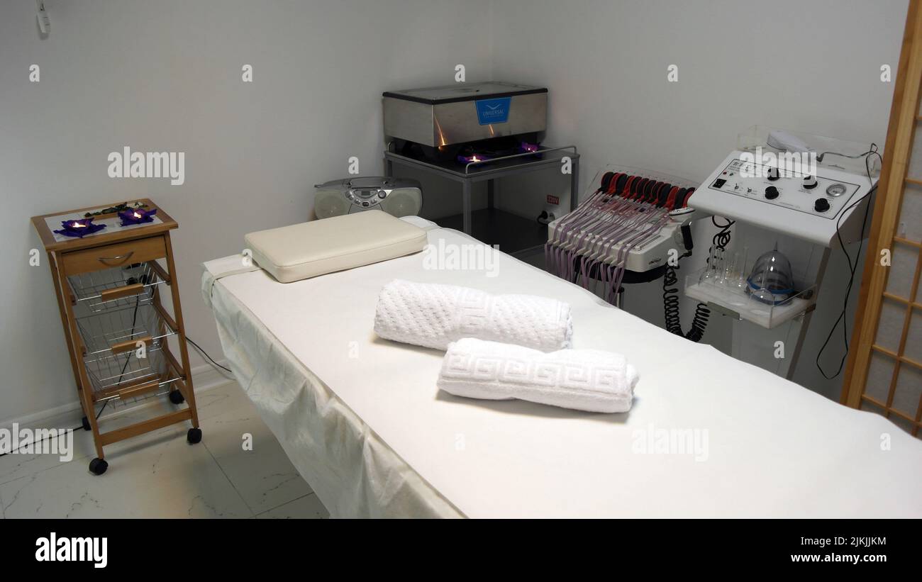 The interior of the massage room, massage table in the spa, skin treatment. Stock Photo