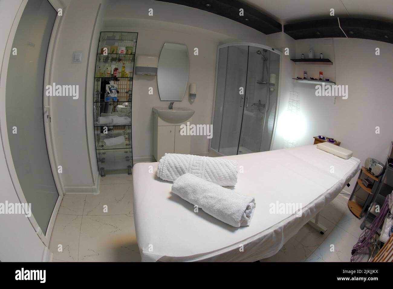 The interior of the massage room, massage table in the spa, skin treatment. Stock Photo