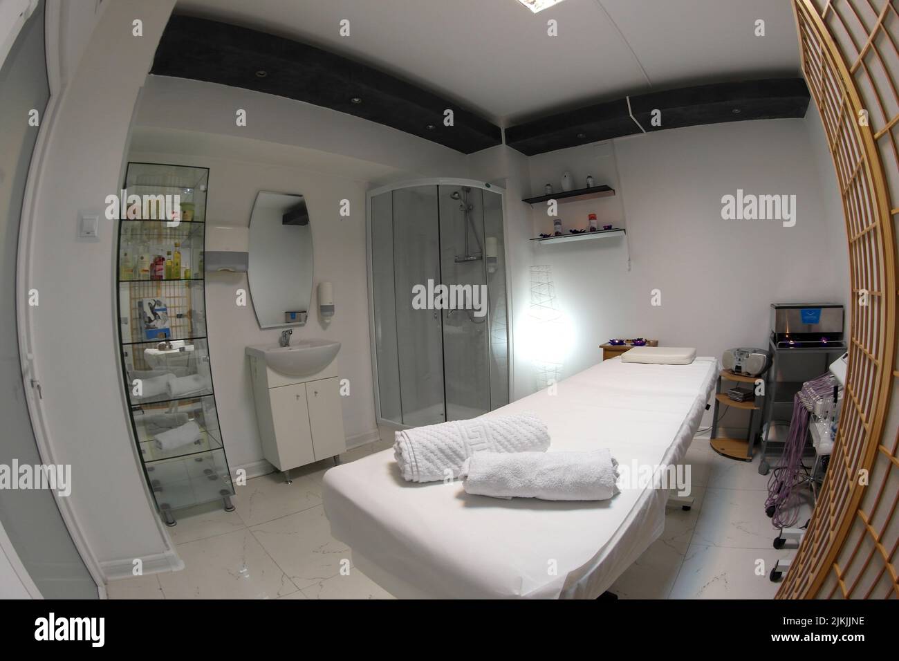 The interior of the massage room, massage table in the spa, skin treatment. Stock Photo