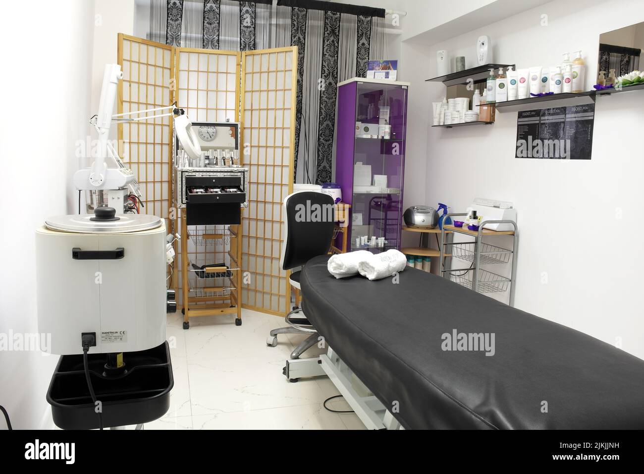 The interior of the massage room, massage table in the spa, skin treatment. Stock Photo