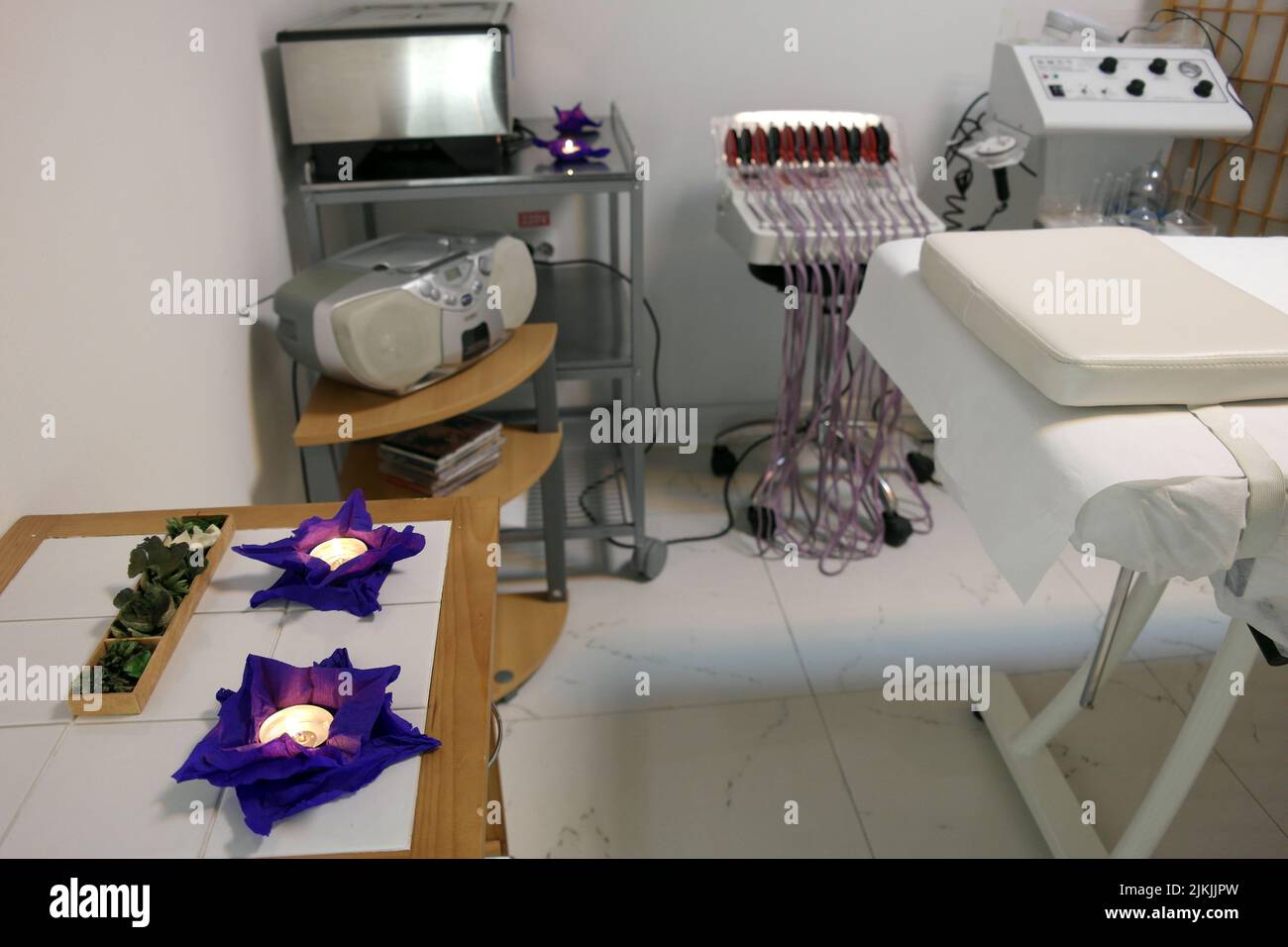 The interior of the massage room, massage table in the spa, skin treatment. Stock Photo