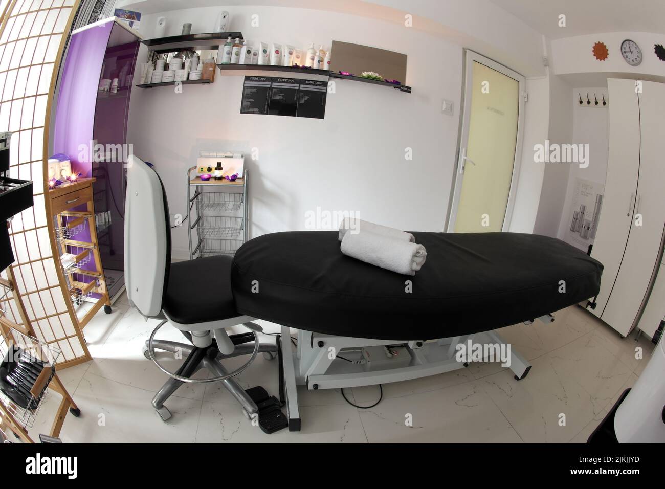 The interior of the massage room, massage table in the spa, skin treatment. Stock Photo